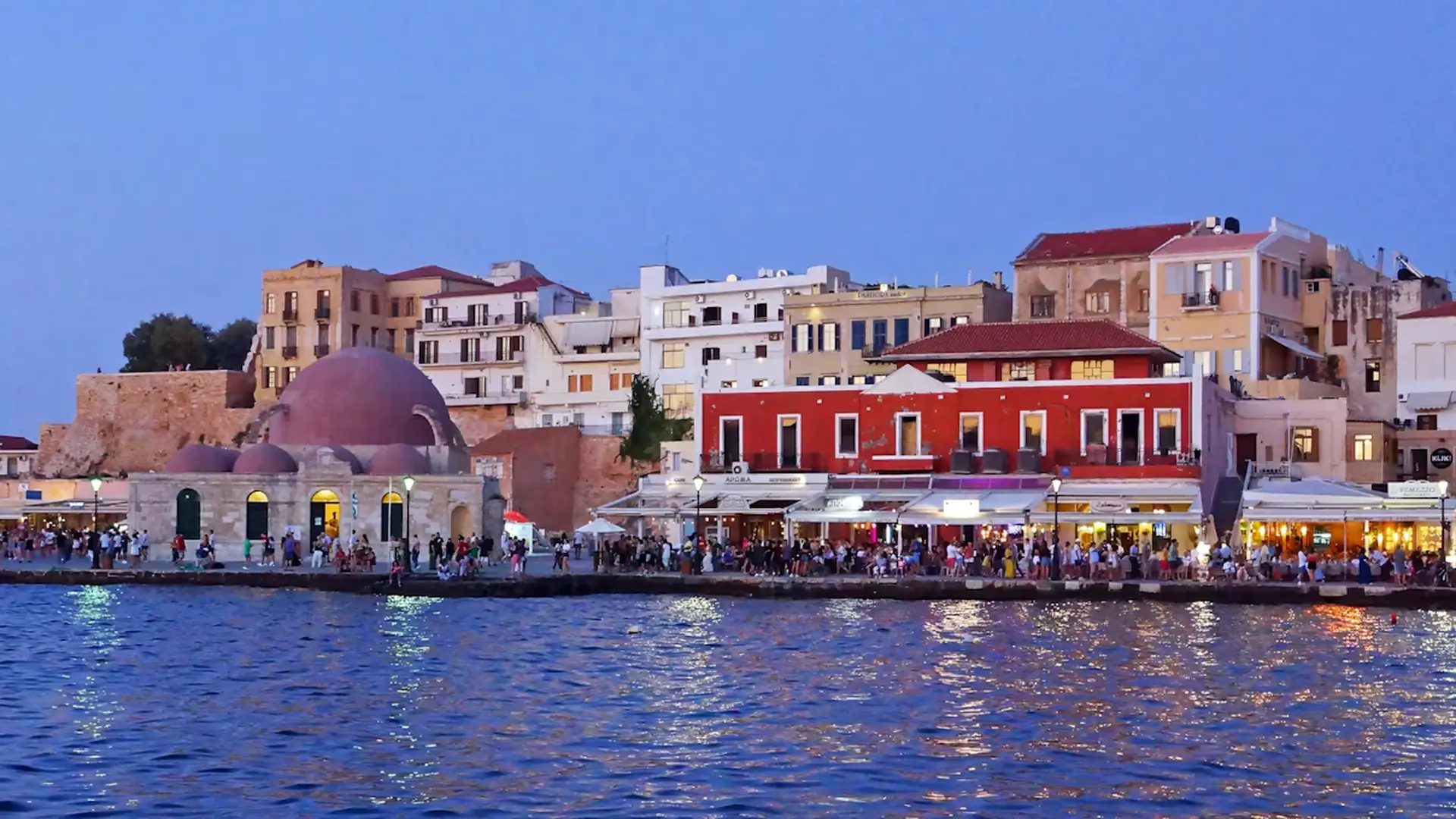 The old Venetian harbour of Chania at dusk